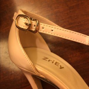 Size 34 (US 4) nude/beige, high heels.